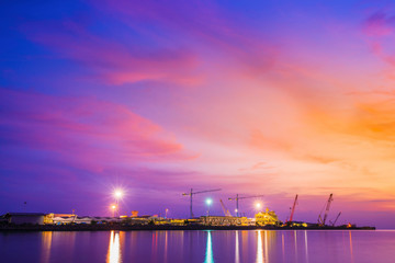 Silhouettes of crane the evening sky.