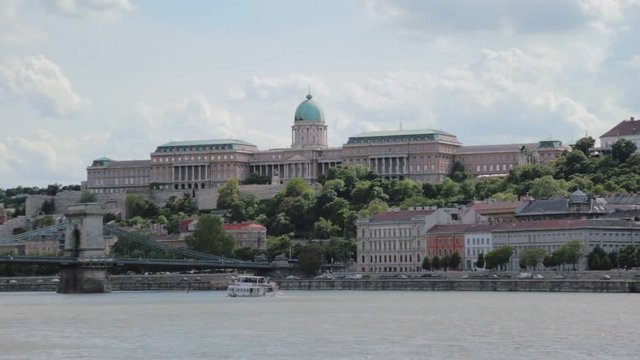 Standing footage from the side of buda and Buda Castle with less water traffic in Budapest.