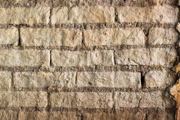 Wall texture made with mud blocks, Traditional Venezuelan technique. Texture of old bricks