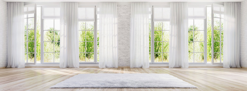 White interior design with large windows