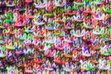 Fototapeta premium Gestricktes Muster für Socken in knallig gefärbter Sockenwolle