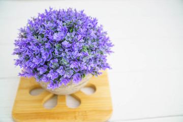 Purple artificial flower.selective focus