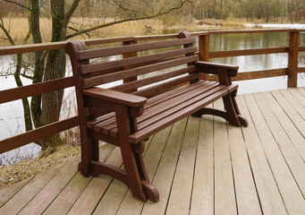 Fototapeta na wymiar Wooden bench in the Park