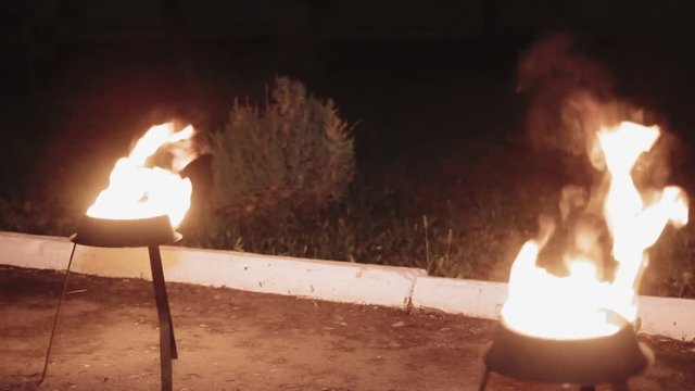 fire burning in the bowl in the dark