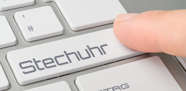 Tastatur mit beschrifteter Taste - Stechuhr