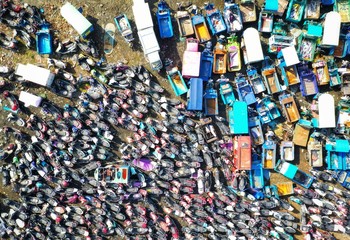Old motor vehicles piled up waiting to be dismantled and eliminated
