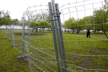Big metal fence in a park