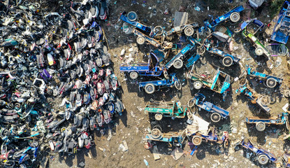 Old motor vehicles piled up waiting to be dismantled and eliminated