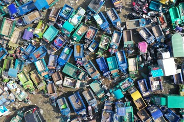 Old motor vehicles piled up waiting to be dismantled and eliminated