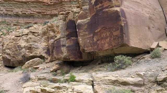 Flying in towards petroglyphs on rock in Nine Mile Canyon in the Utah desert.