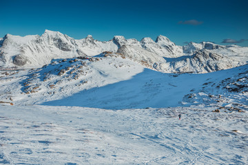 Beautiful landscape of high snow-capped mountains in Norway