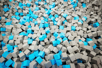 Gray and blue foam cubes on the playground in the trampoline center