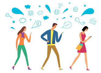 People walking and  looking on their phones.
