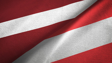 Latvia and Austria two flags textile cloth, fabric texture 