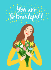 Beautiful girl holding a bouquet of flowers