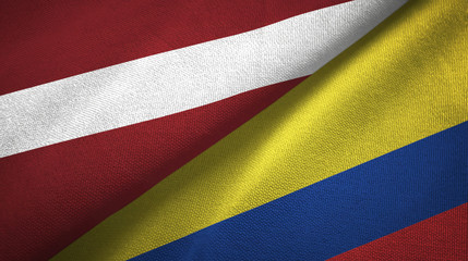 Latvia and Colombia two flags textile cloth, fabric texture