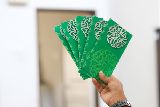 Money packet as Hari Raya gift for Ramadan and Eid Fitr Celebration. "Salam or Selamat Aidilfitri" text in Arabic and Malay translated in English as "Eid al-Fitr"