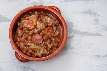 typical portuguese dish beans with meat, vegetables and smoked sausages Feijoada