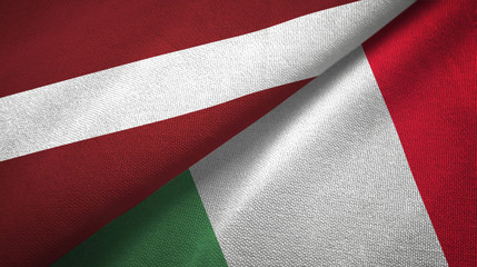 Fototapeta na wymiar Latvia and Italy two flags textile cloth, fabric texture