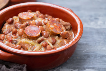 typical portuguese dish beans with meat, vegetables and smoked sausages Feijoada