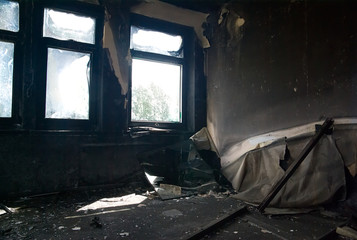 Burned interiors and furniture in industrial building