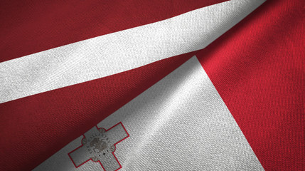 Latvia and Malta two flags textile cloth, fabric texture