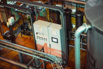 Stainless steel pipes in the factory. Construction on food production, Abstract industry background.