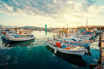 Naklejka na ściany i meble Harbor with leisure and fishing boats at anchor, Perdika, Egina Island, Greece.
