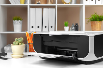 Printer, copier, scanner in office. Workplace.