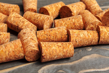 Wine corks on wooden background