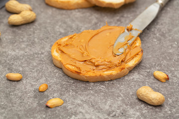 Peanut butter. Peanut butter sandwiches or toasts. Natural organic vegetarian food. 