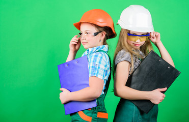 Initiative children girls provide renovation their room green background. Child care. Renovation plan. Home improvement. Builder engineer architect. Future profession. Kids girls planning renovation