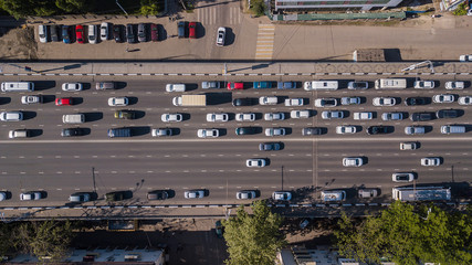 Top down aerial view of urban city traffic jam rush hour highway.