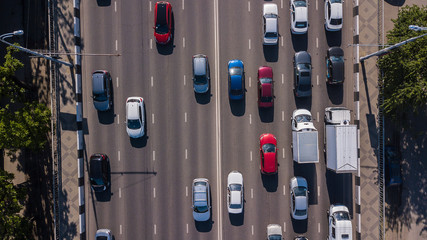 Top down aerial view of urban traffic jam rush hour highway.