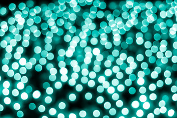 Abstract bokeh background. Soft defocused lights. Neon basic cyan color