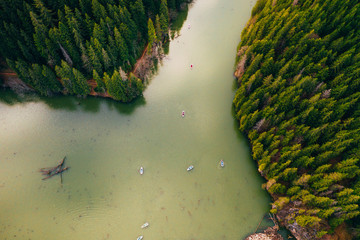 Lake with small boats seen from a drone