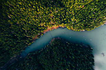 Lake with small boats seen from a drone