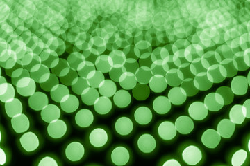 Abstract bokeh background. Soft defocused lights. Neon basic green color