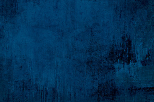 Detail of old distessed  dark blue wall, grungy background or texture