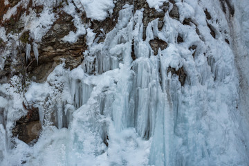 waterfall in winter forest
