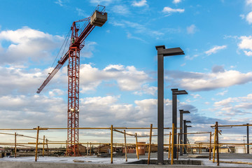 Crane at nightfall in a construction site