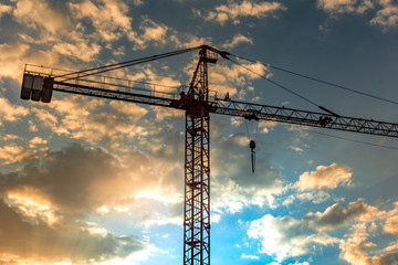 Crane at nightfall in a construction site