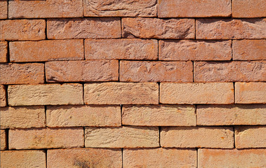 Obraz premium The texture of the brick wall of different colors for construction. Facing building material.