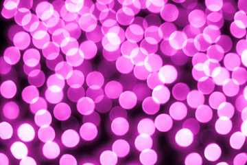Abstract bokeh background. Soft defocused lights. Neon basic pink color