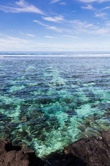 Clear blue pacific ocean water in the reef on a tropical island