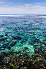 Clear blue pacific ocean water in the reef on a tropical island