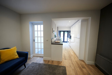 Sitting room and kitchen in newly refurbished house