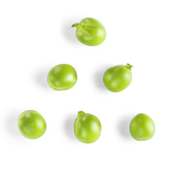 New Year`s tree of green peas on isolated white background