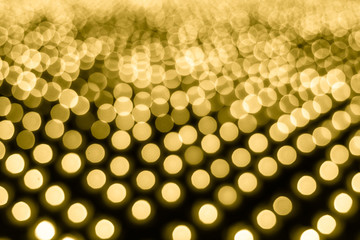 Abstract bokeh background. Soft defocused lights. Neon basic yellow color