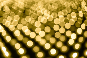 Abstract bokeh background. Soft defocused lights. Neon basic yellow color